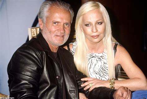 Donatella Versace, 65, shows off her slender figure in an array of.